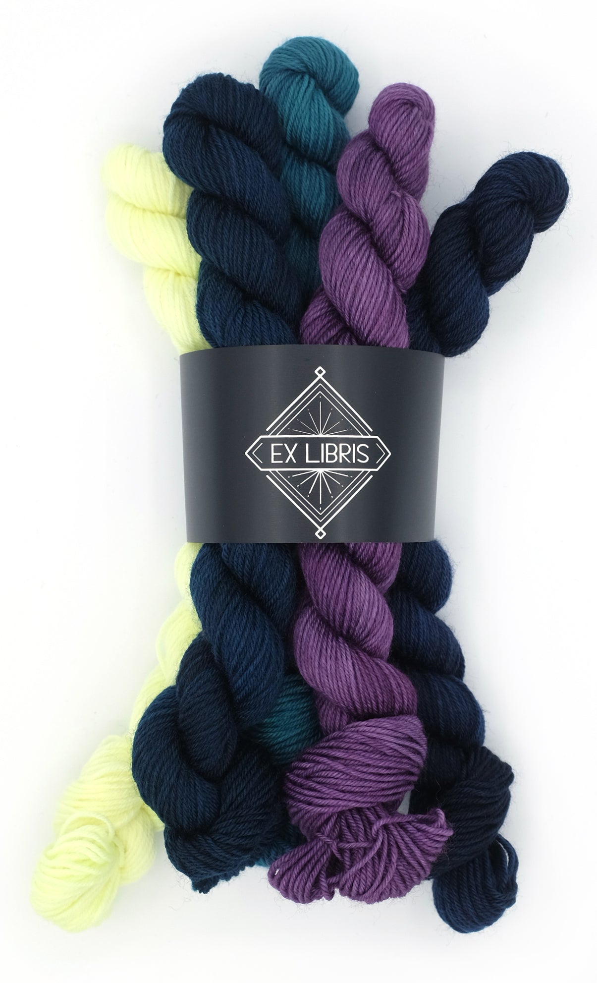 Five mini skeins of yarn in yellow, blues, and purple with a 'Ex Libris' label on a white background.