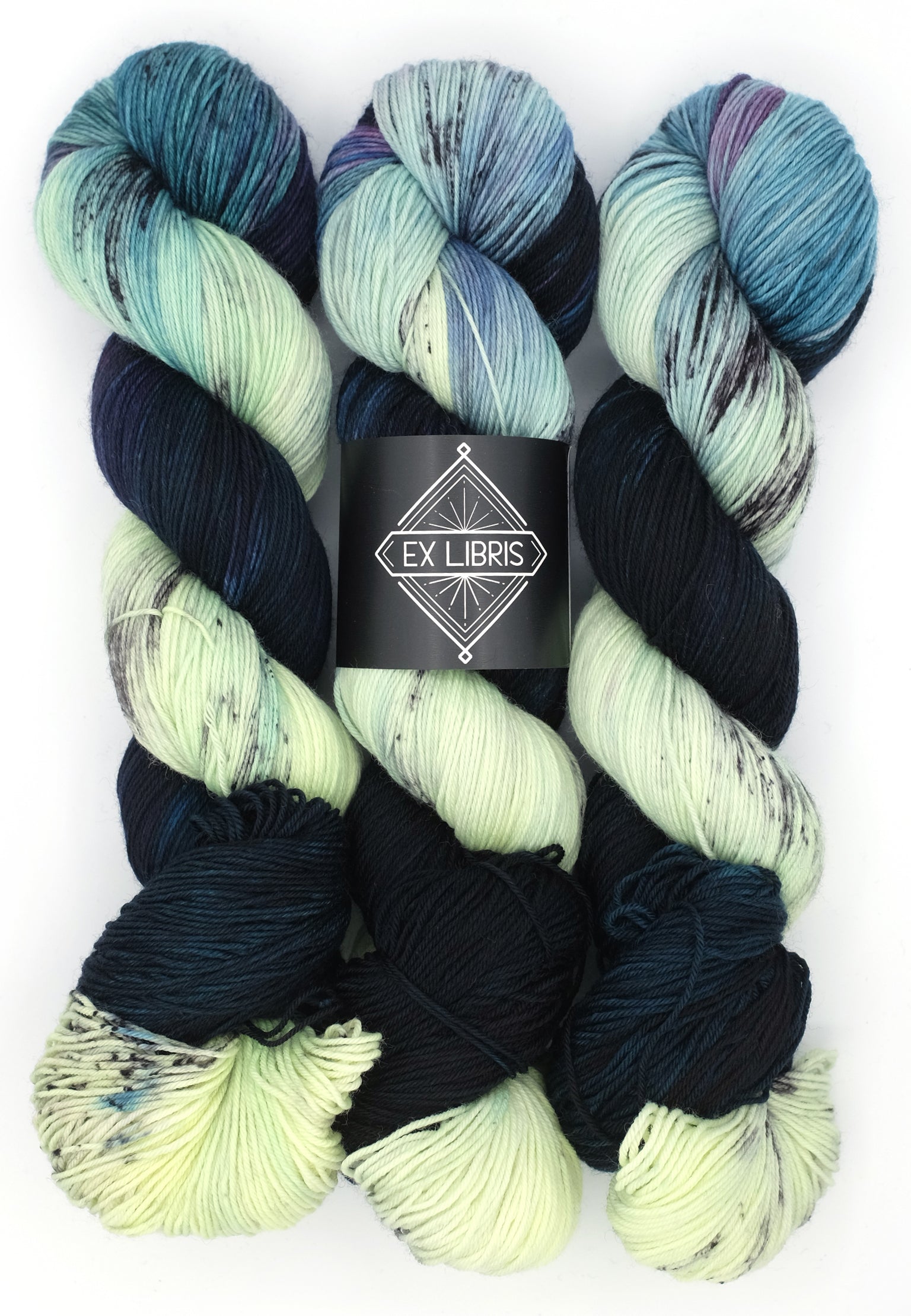 Multicolored yarn skeins with Ex Libris label on a white background